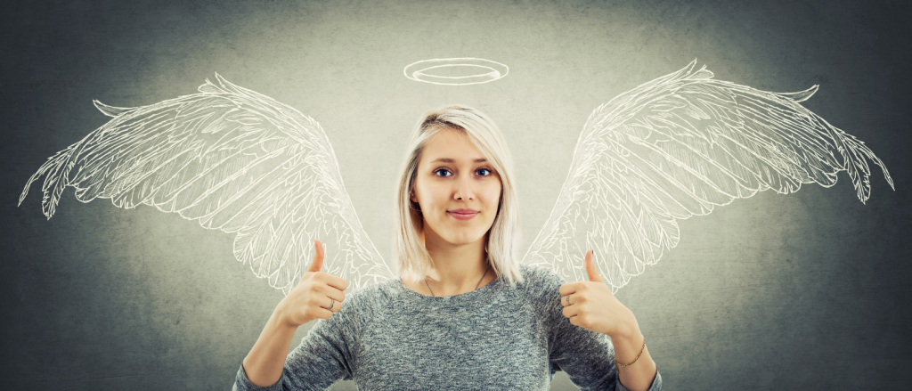 This is a picture of woman with her thumbs up and illustrated wings and a halo above her head. This picture represents a self-aware leader. 